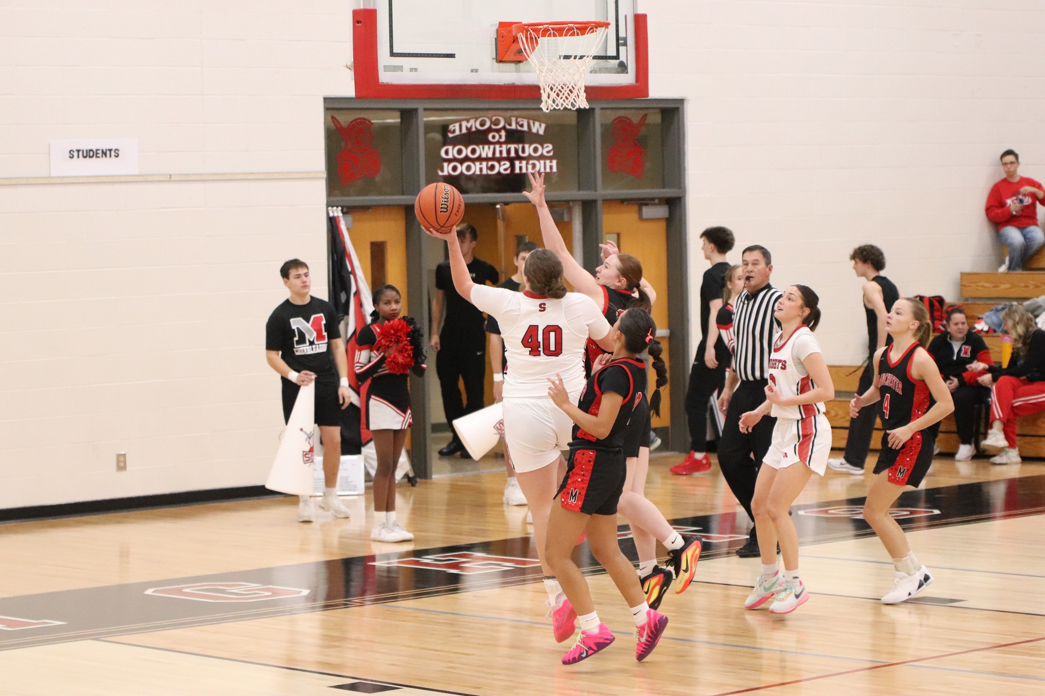 Lady Knights Defend Home Court Against Squires